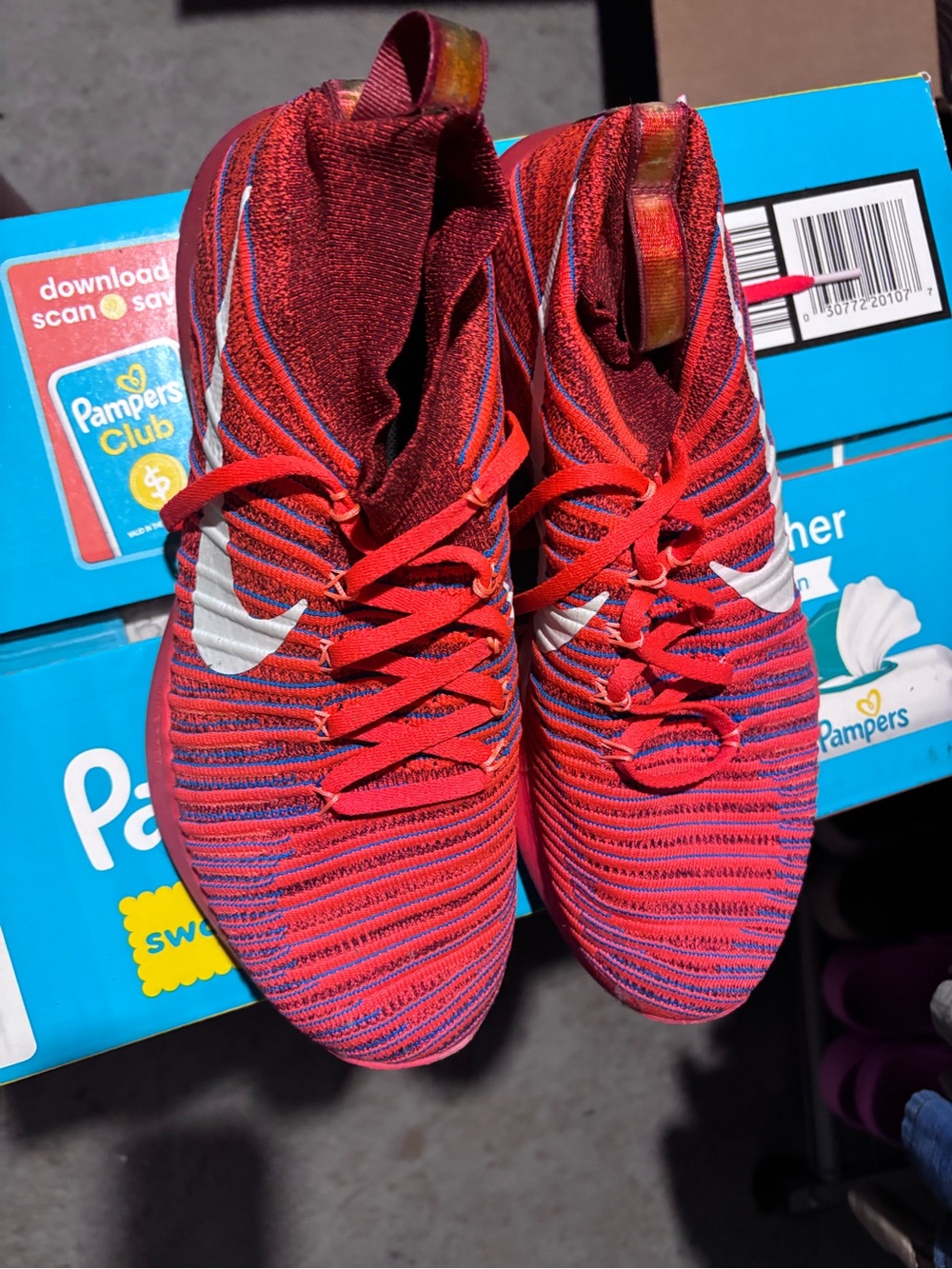 Nike men’s Red and Blue Flyknit Athletic Shoes